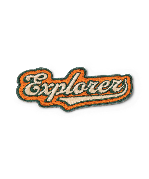 embroidered patch for adventure dogs that reads explorer